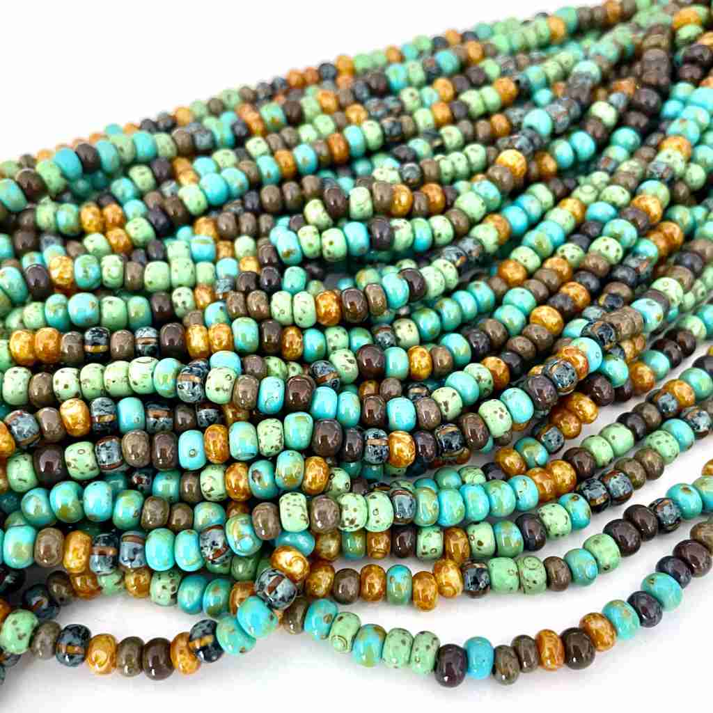 strands of green and blue turquoise, brown and mustrd colored seed beads