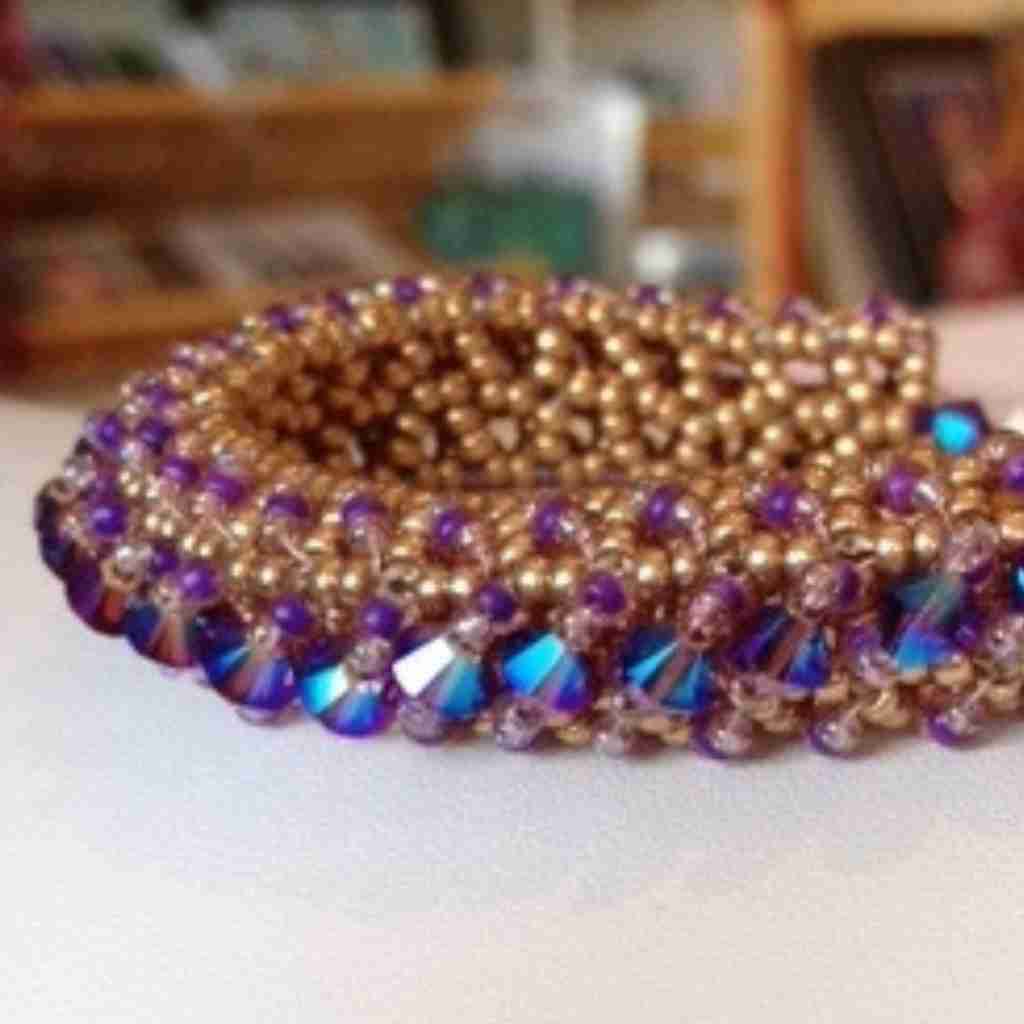 elegant seed bead bracelet with purple crystal bicones