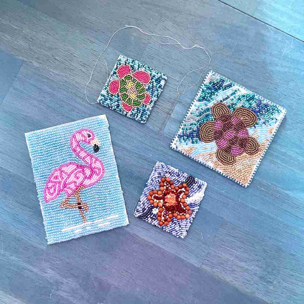 colorful Bead embroidered turtles, flamingo, and starfish