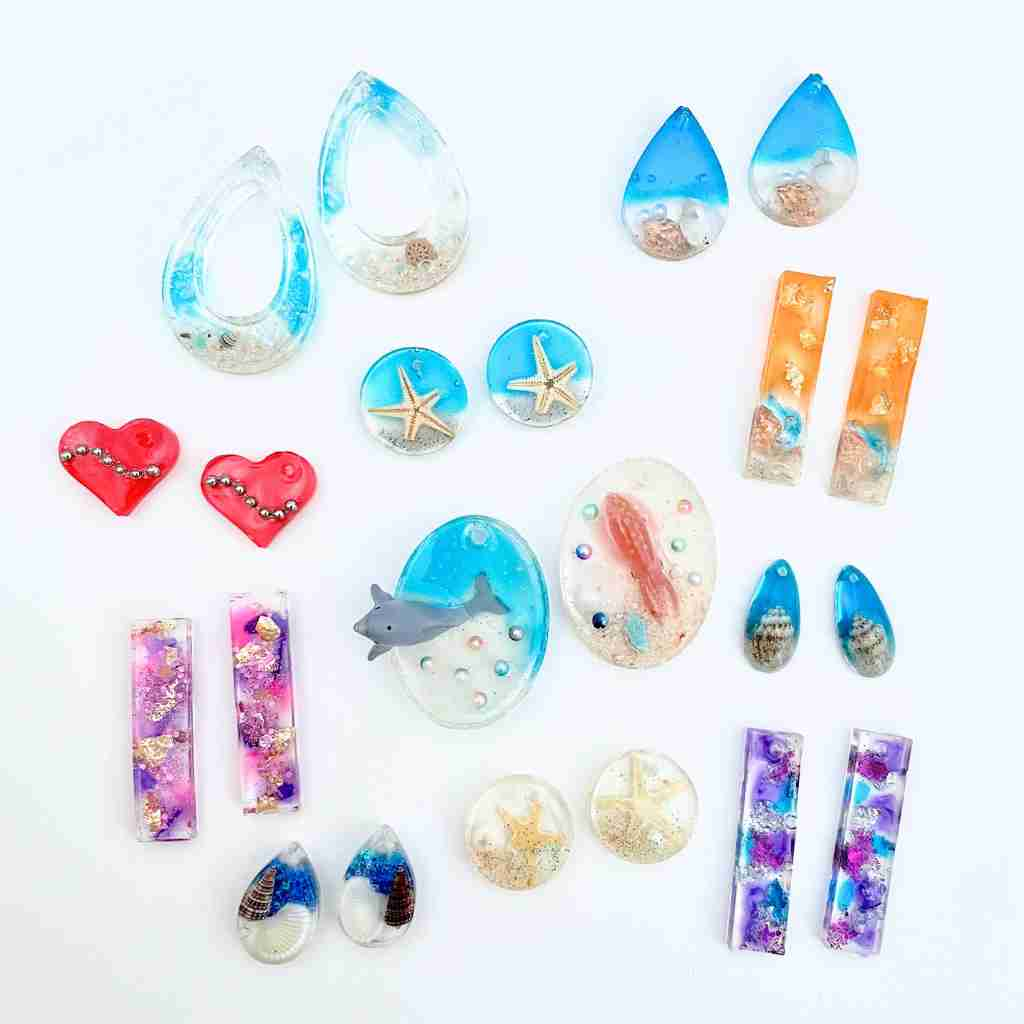 colorful resin pendants make with molds with a coastal theme