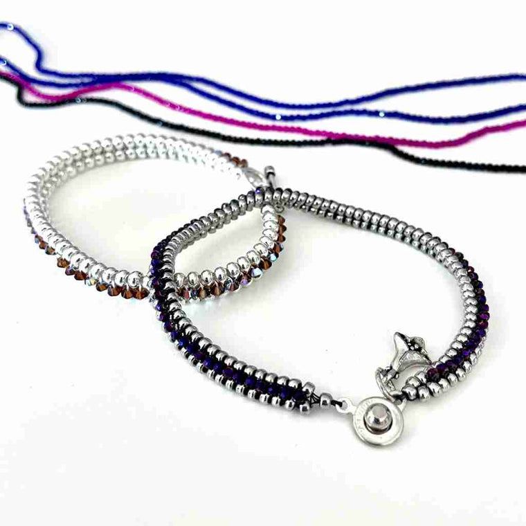 size 8° seedbeeds with 2mm crystals up the center. snap clasp