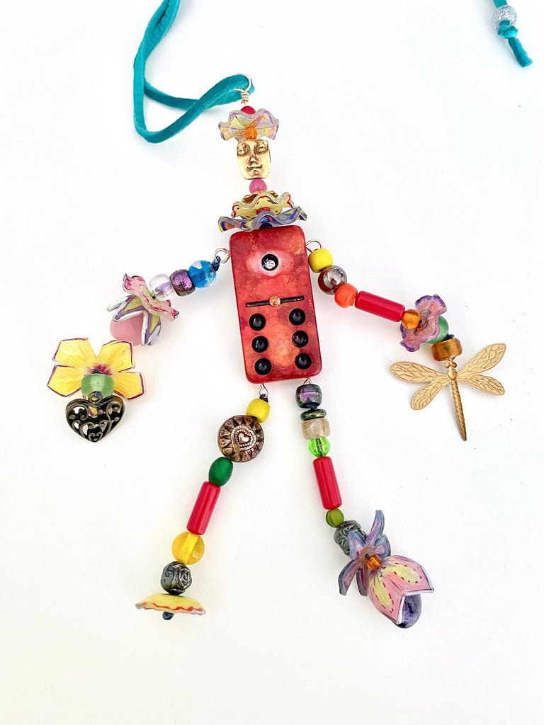 Domino Doll necklace with beaded arms and legs