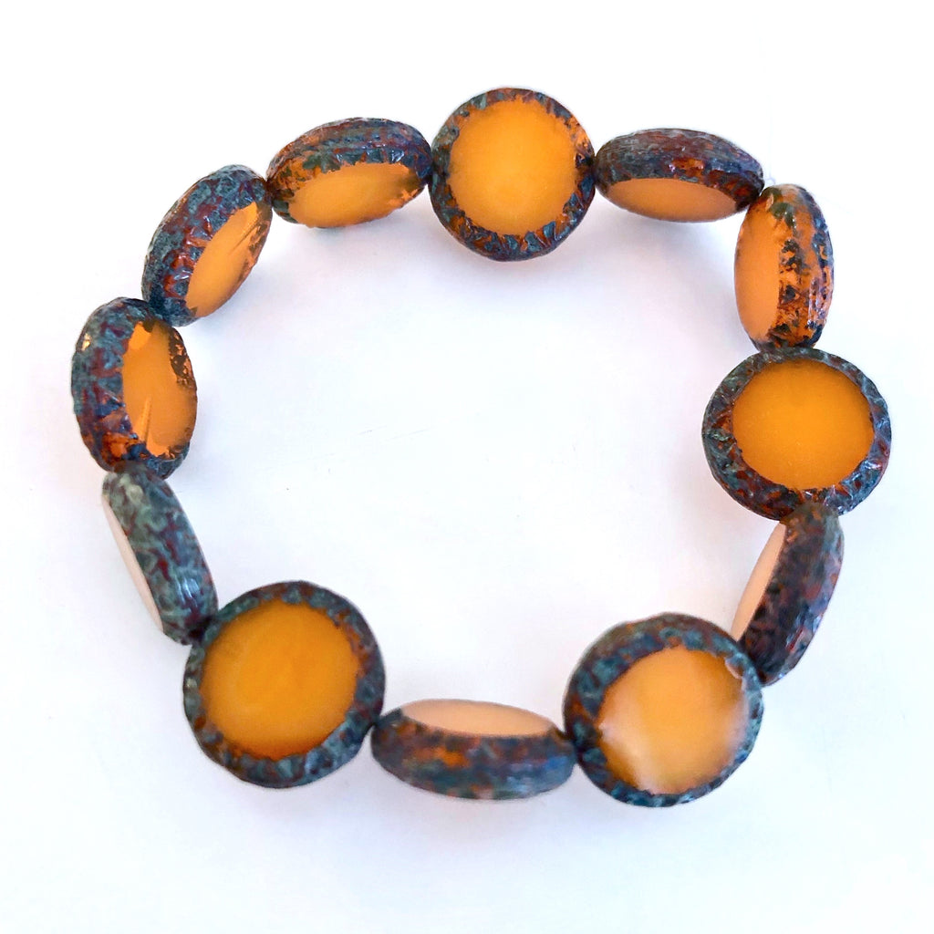 Mayan Sun Czech glass beads - Transparent Squash Orange