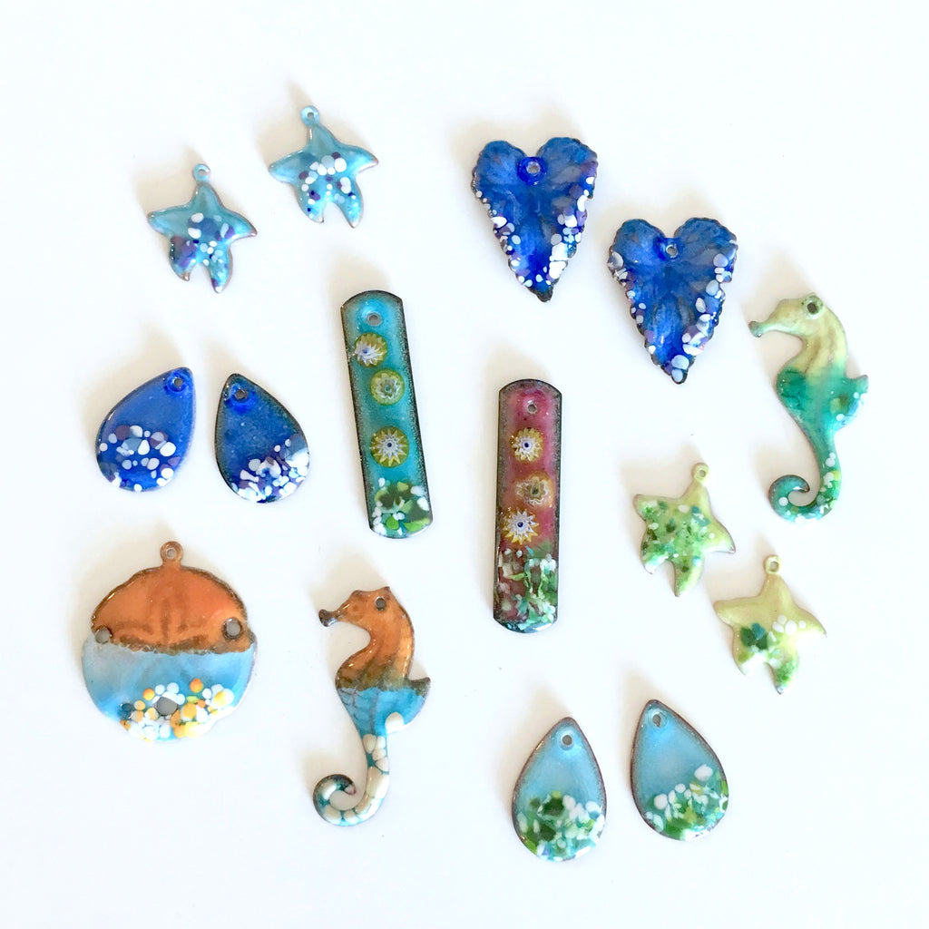 torch fired enamel charms by Colleen Ewart